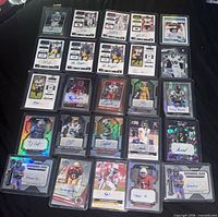 Full layout of 25 shown, middle 20 comprise the lot of autograph rookie cards