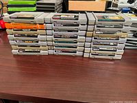 All 21 SNES cartridges stacked on desk