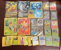 All cards laid out showing quantity, oversized promos, sleeved and unsleeved cards