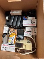 Overview of boxed office supplies inside carton
