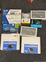 All eight boxed networking items laid out