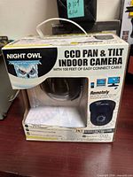 Front of boxed Night Owl CAM-PT-SH420-24 camera