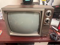 Front view of the Panasonic TR-1215T CRT television showing screen, cabinet, power cord
