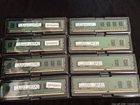 Eight Samsung 4GB DIMM modules in two rows, all in clamshell cases