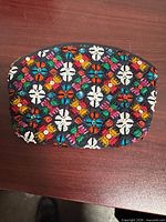 Front view of pouch showing full beaded pattern