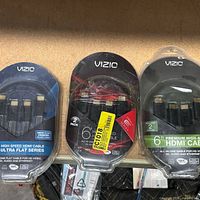 Front view of three VIZIO HDMI cable packs highlighting the Ultra Flat Series 6 ft 2-pack on left