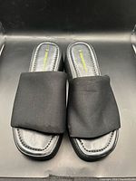 Top view of both sandals showing fabric vamps and footbeds