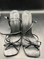 Top view of both sandals showing straps, bows, footbeds marked Streetwear Society
