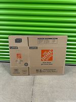 Front view of both flattened Home Depot large moving boxes