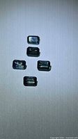 Top view of five octagon-cut sapphires
