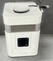 Front and side view of humidifier showing control panel
