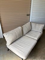 Front/side view showing cushions and frame