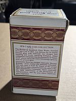 Side of box showing historical description of 1876 Cape Cod Collection