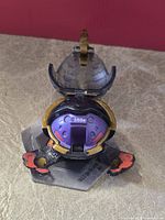 Bakugan figure open on Gate Card showing 350G marking