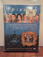Front of sealed Friends Season 8 DVD set showing title and price sticker