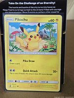 Front of Pikachu 30/111 Crimson Invasion card