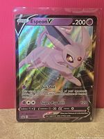 Front of Espeon V promo card in sleeve