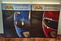 Front view of both sealed steelbook sets, Seasons Two and Three