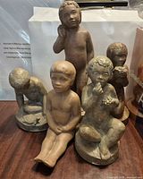 Front view of all five PRF boy sculptures