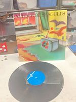 Front sleeve artwork and vinyl record front side