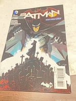 Front cover of Batman (The New 52) #34 comic showing full artwork and barcode