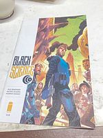 Front cover of Black Science #12 comic showing art and Image Comics logo