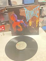 Front sleeve showing Bowie artwork with record