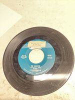 Side showing The Majestic label with jukebox strip and wear