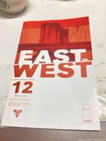 Front cover of East of West #12 showing title, issue number, design