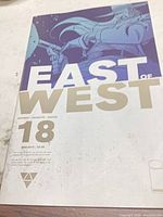 Front cover showing title, issue number 18, publisher, creators