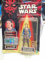 Front view of blister-carded Padmé Naberrie figure with CommTech chip