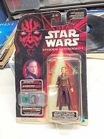 Front view of sealed Queen Amidala figure on Episode I card with CommTech chip visible