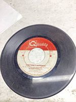 Side A showing Quality label and song title "Something's Happening"