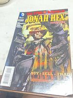 Front cover showing title, artwork, issue number and price