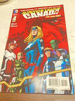 Front cover of Justice League Canada #1 comic showing title, artwork, barcode and DC logo