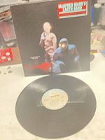 Front album cover and record showing Arista label
