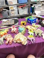 Overview of all ponies on purple surface