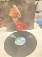 Front sleeve and vinyl record showing label and overall condition