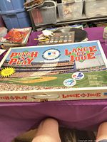Full view of Pitch 'N' Play / Lance et Joue game box on table