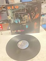Front of sleeve with vinyl disc foreground