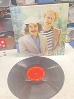 Front sleeve and vinyl record displayed