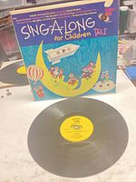 Front cover and record showing yellow Happy Time label