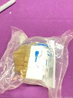 Front view of sealed bag showing R2-D2 pieces