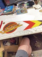 Full view of pennant showing logo and chevron design
