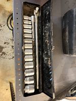 Open case displaying sockets and extension bar