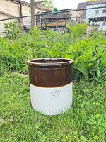 Front view showing brown glaze, cream body, crown 5 mark