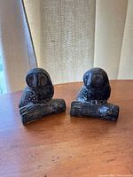 Front view of both soapstone owl figurines