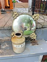 Mirror and jug on step showing overall lot