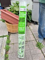 Full view of packaged plastic sheeting roll with Mastercraft branding and size details