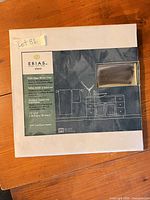 Front of boxed Erias View plain edge mirror tiles